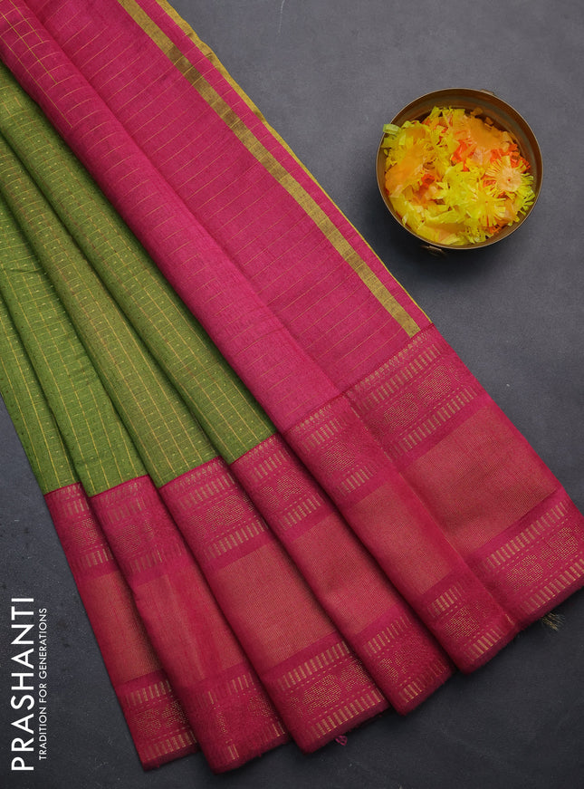 Semi dupion saree mehendi green and magenta pink with allover zari checks & buttas and long zari woven border