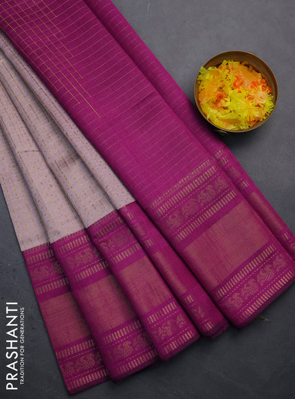 Semi dupion saree pastel pink and purple with allover zari checks & buttas and long zari woven border