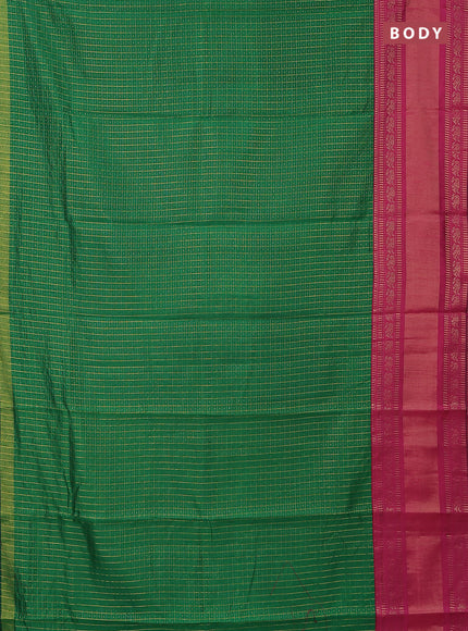 Semi dupion saree green and magenta pink with allover zari checks & buttas and long zari woven border