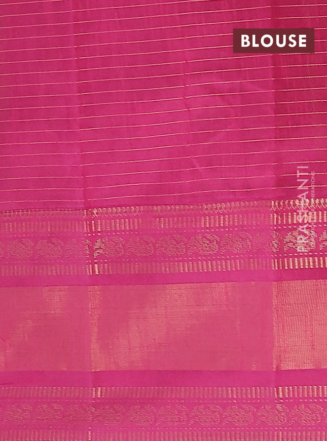 Semi dupion saree green and magenta pink with allover zari checks & buttas and long zari woven border