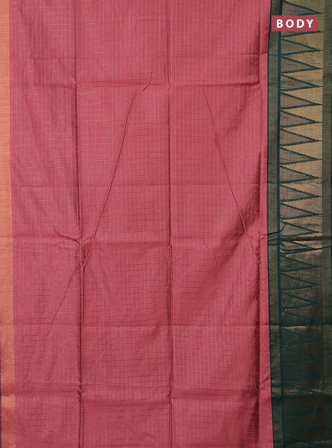 Semi dupion saree peach shade and bottle green with allover zari checked pattern and long temple zari woven border
