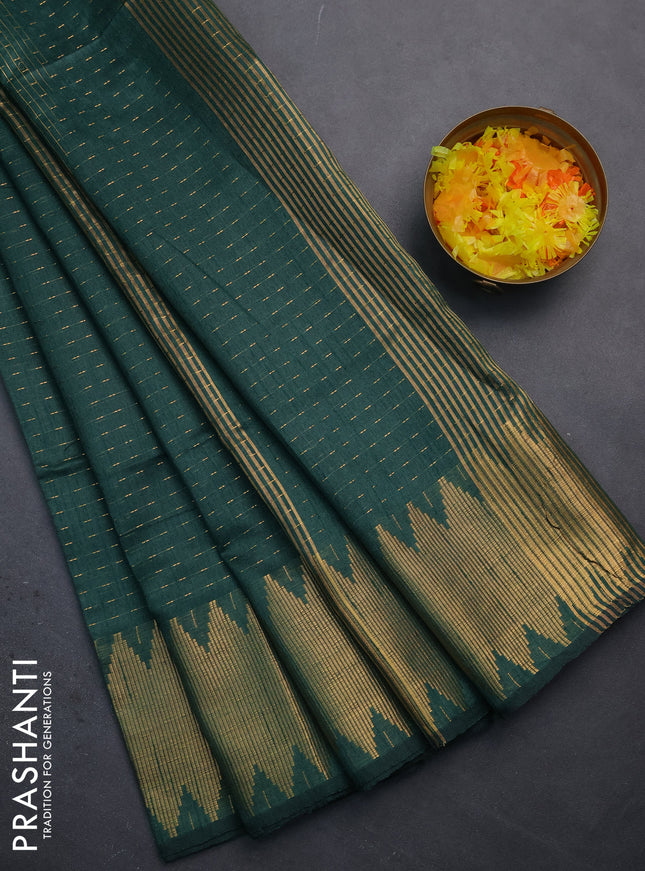 Semi dupion saree bottle green with allover zari woven buttas and temple zari woven border