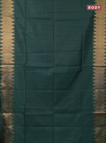 Semi dupion saree bottle green with allover zari woven buttas and temple zari woven border