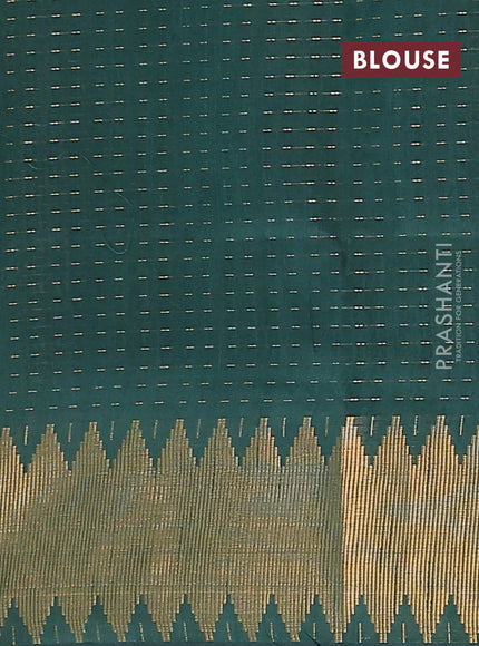 Semi dupion saree bottle green with allover zari woven buttas and temple zari woven border