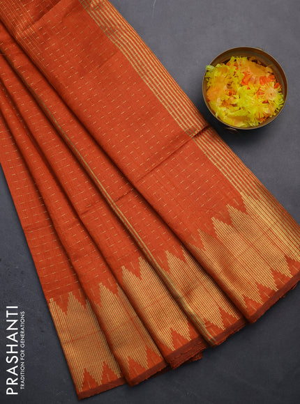 Semi dupion saree orange with allover zari woven buttas and temple zari woven border