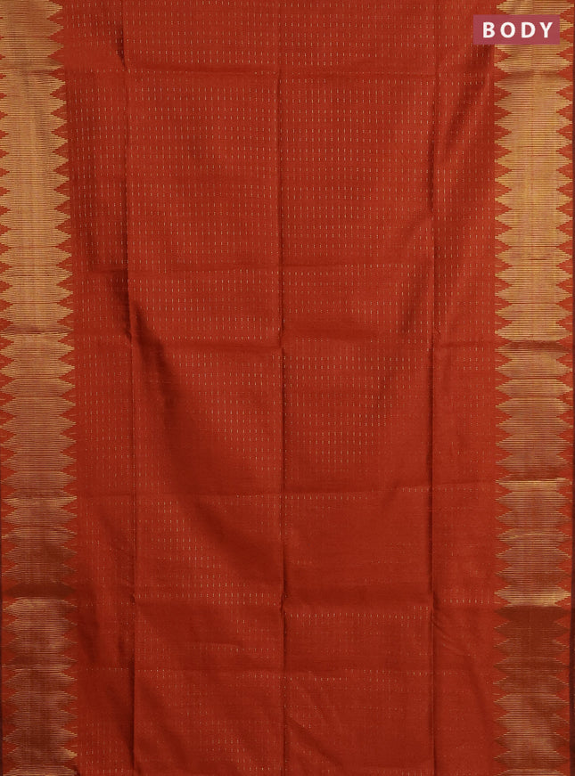 Semi dupion saree orange with allover zari woven buttas and temple zari woven border