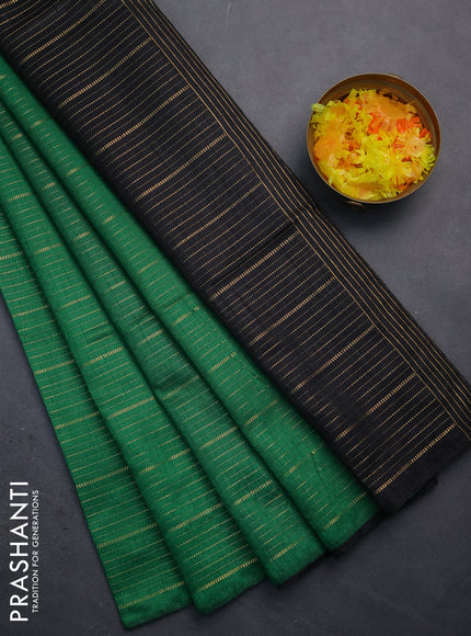 Semi dupion saree green and black with allover zari weaves in borderless style