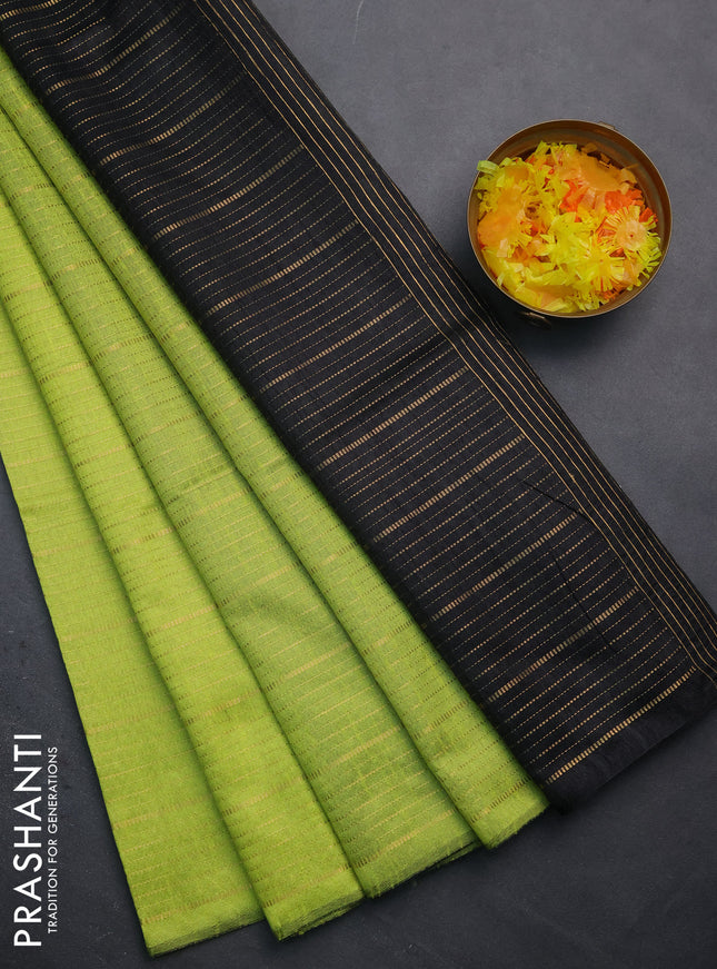 Semi dupion saree fluorescent green and black with allover zari weaves in borderless style
