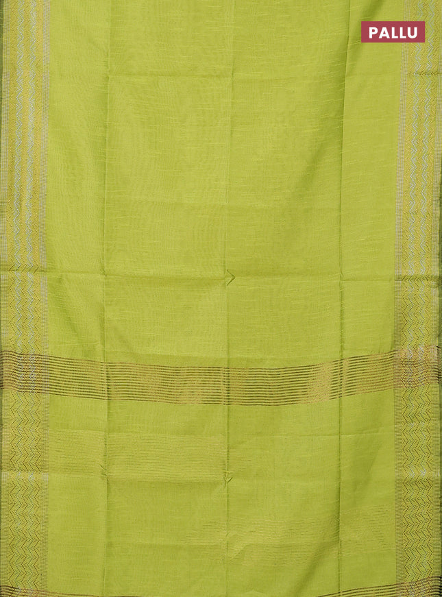 Semi dupion saree fluorescent green with plain body and silver & gold zari woven border
