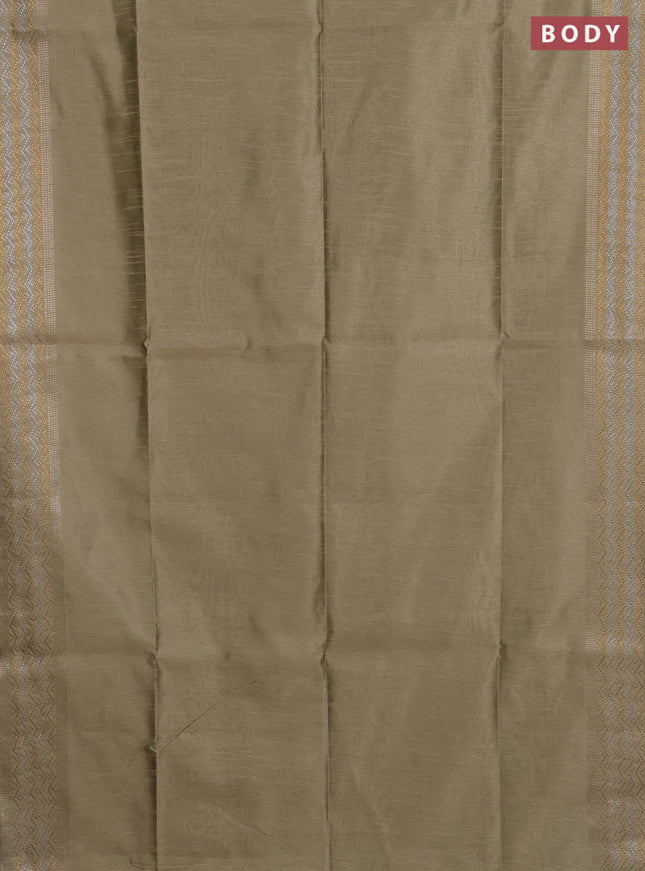 Semi dupion saree beige with plain body and silver & gold zari woven border