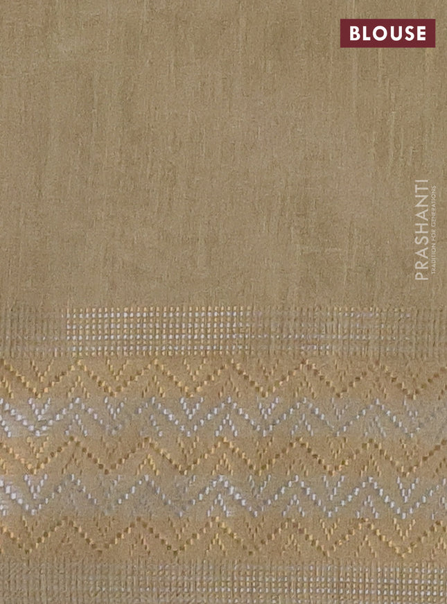 Semi dupion saree beige with plain body and silver & gold zari woven border