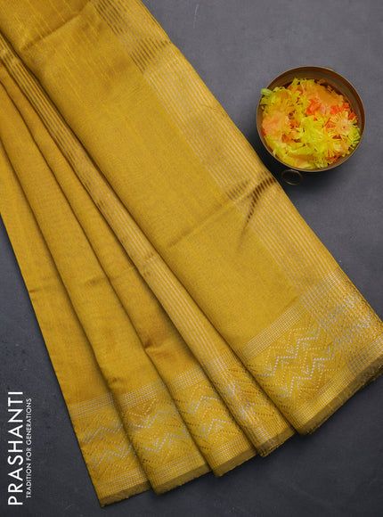 Semi dupion saree yellow with plain body and silver & gold zari woven border