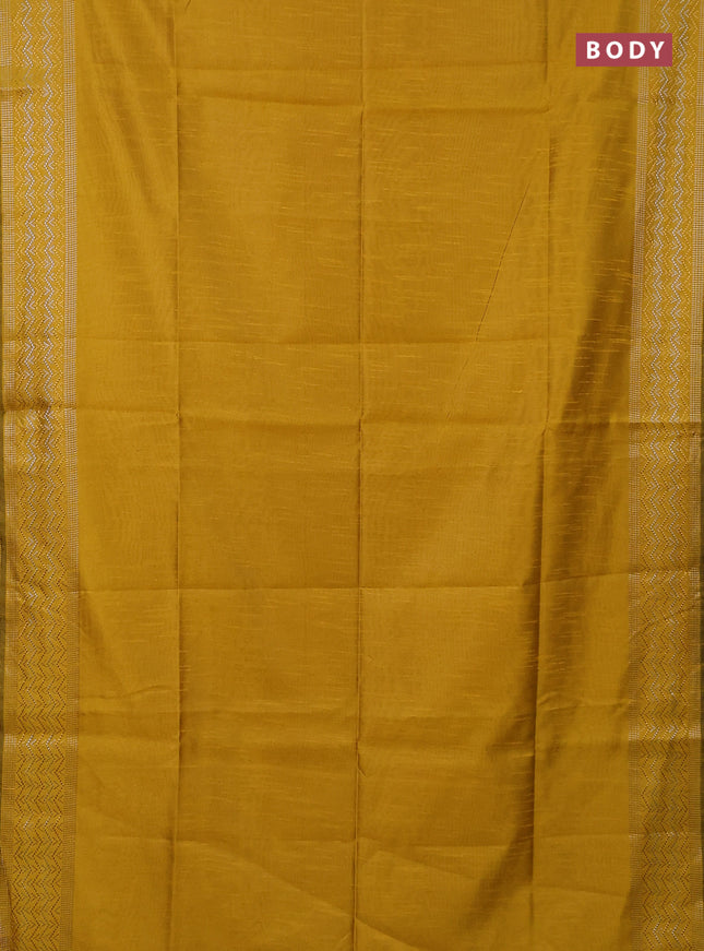 Semi dupion saree yellow with plain body and silver & gold zari woven border