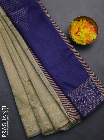 Semi dupion saree beige and navy blue with plain body and silver & gold zari woven border