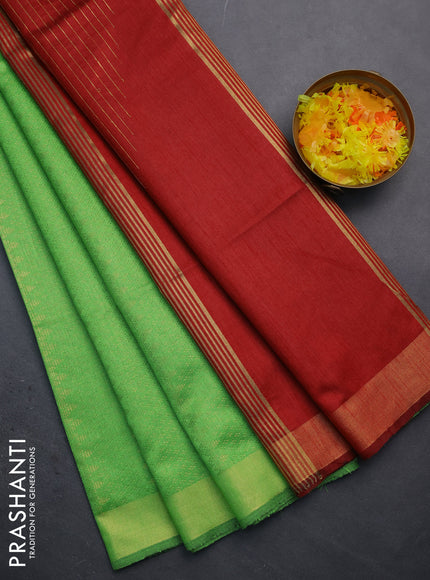 Semi dupion saree parrot green and maroon with allover zari weaves and zari woven border