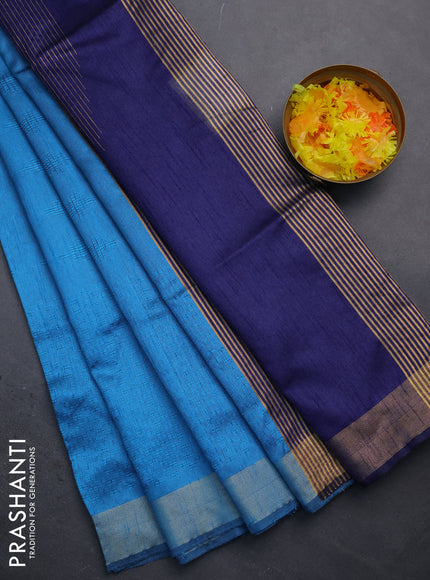 Semi dupion saree cs blue and blue with allover self emboss and zari woven border