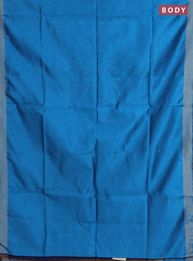 Semi dupion saree cs blue and blue with allover self emboss and zari woven border