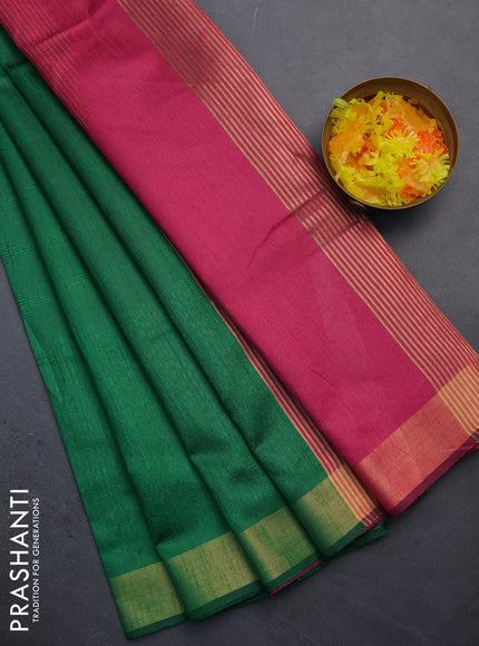 Semi dupion saree green and pink with allover self emboss and zari woven border