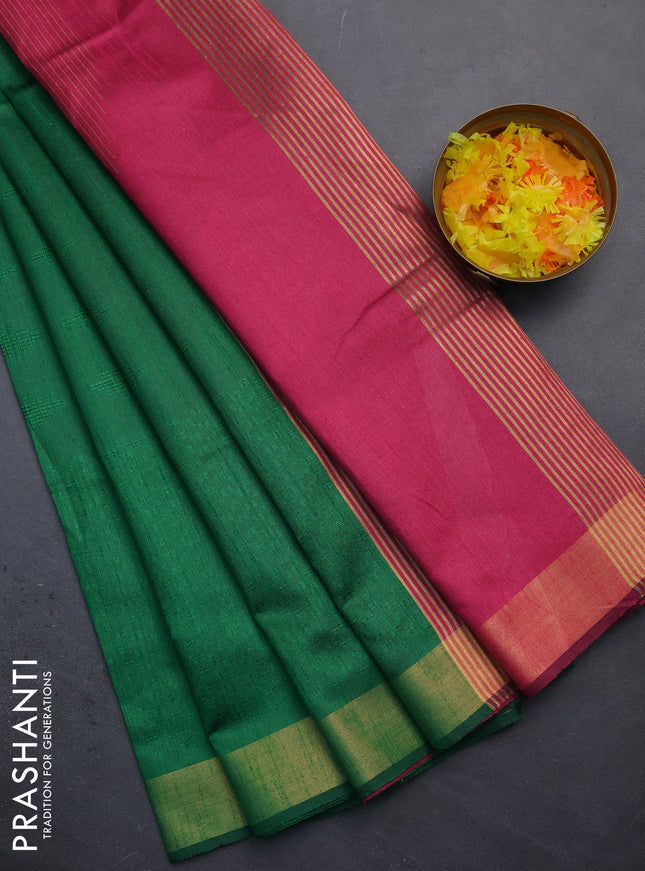 Semi dupion saree green and pink with allover self emboss and zari woven border