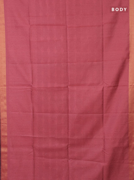 Semi dupion saree peach shade and blue with allover self emboss and zari woven border