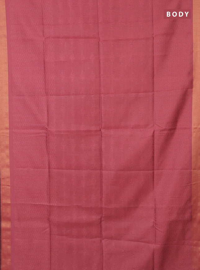 Semi dupion saree peach shade and blue with allover self emboss and zari woven border