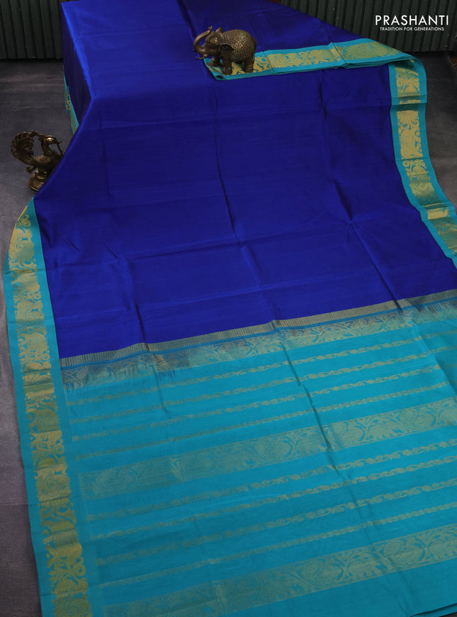 Silk cotton saree blue and teal blue with plain body and zari woven korvai border