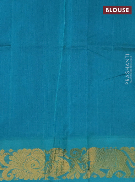 Silk cotton saree blue and teal blue with plain body and zari woven korvai border
