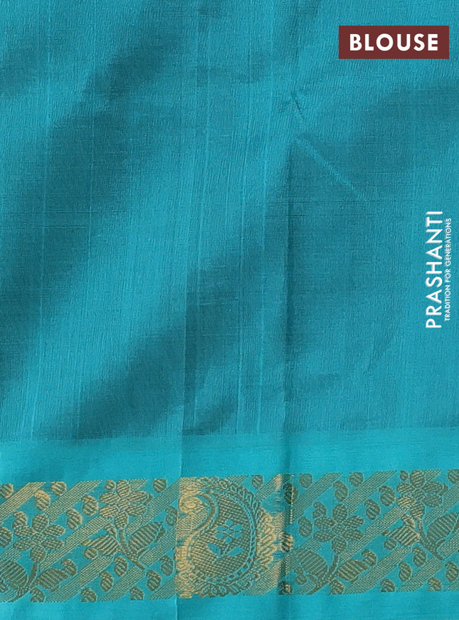 Silk cotton saree deep maroon and teal blue with plain body and zari woven korvai border