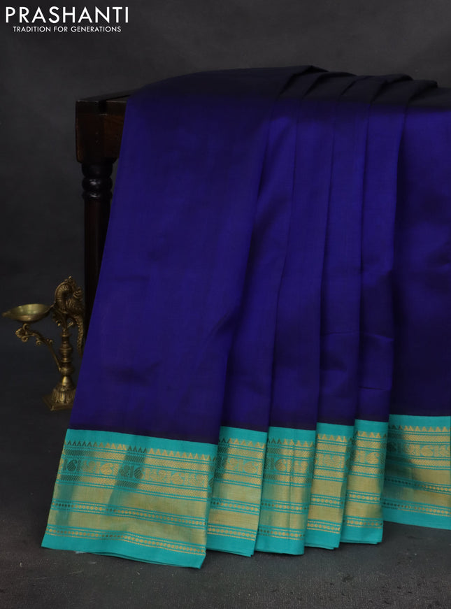 Silk cotton saree blue and teal blue with plain body and zari woven korvai border