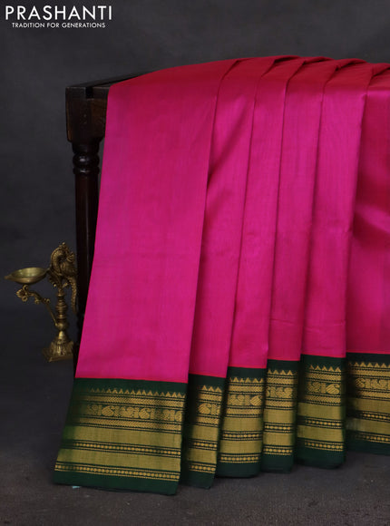 Silk cotton saree pink and green with plain body and zari woven korvai border