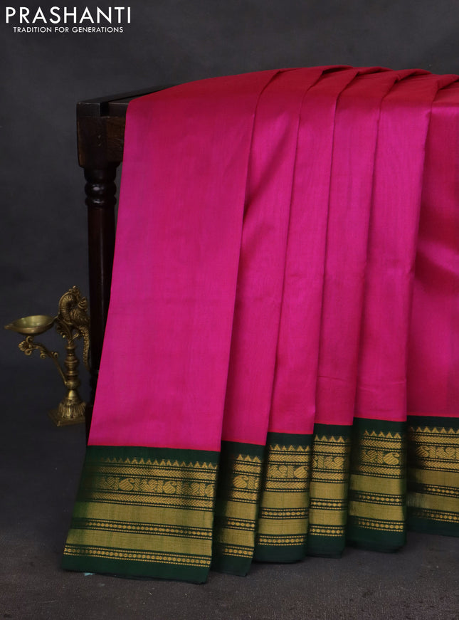 Silk cotton saree pink and green with plain body and zari woven korvai border