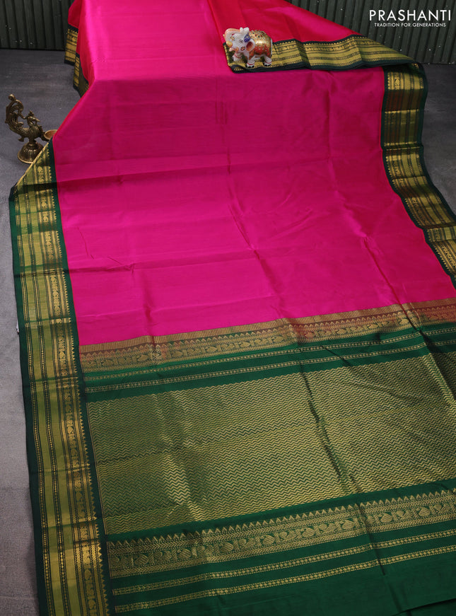 Silk cotton saree pink and green with plain body and zari woven korvai border