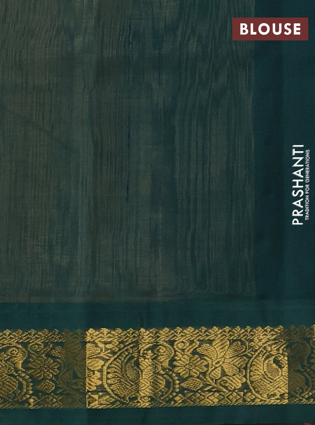 Silk cotton saree pale orange and green with plain body and zari woven korvai border