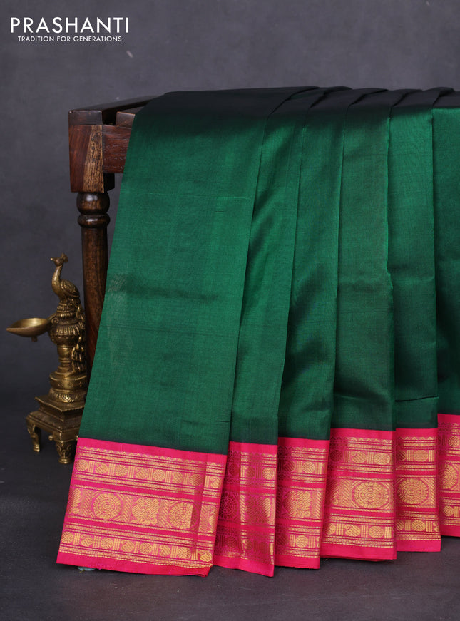 Silk cotton saree green and pink with plain body and zari woven korvai border
