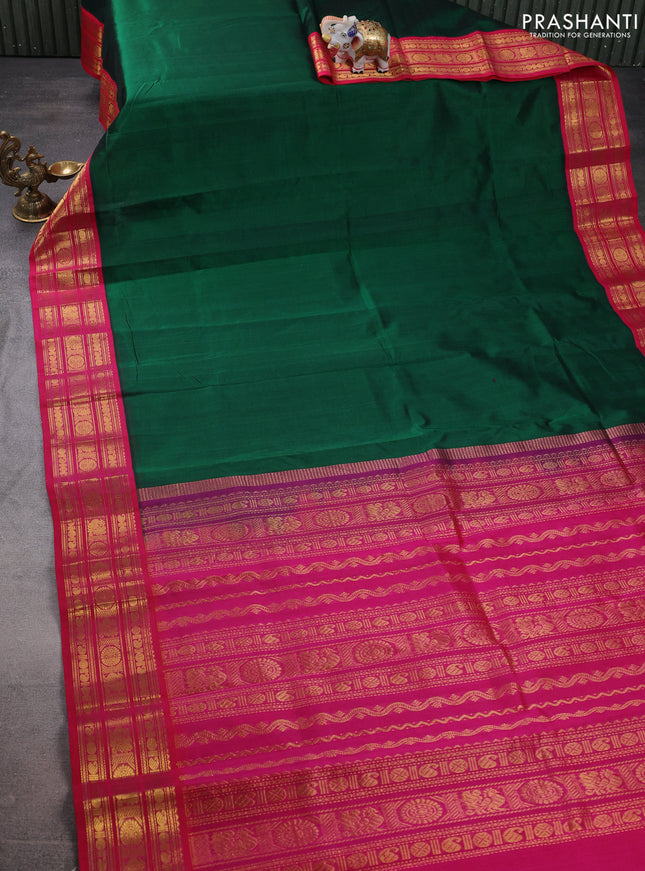 Silk cotton saree green and pink with plain body and zari woven korvai border