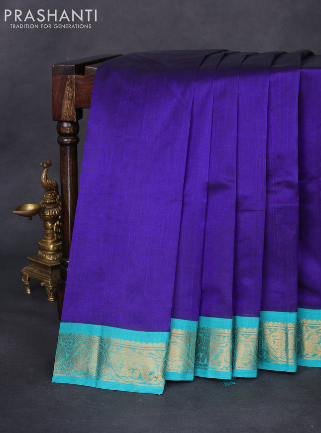 Silk cotton saree blue and teal blue with plain body and zari woven korvai border