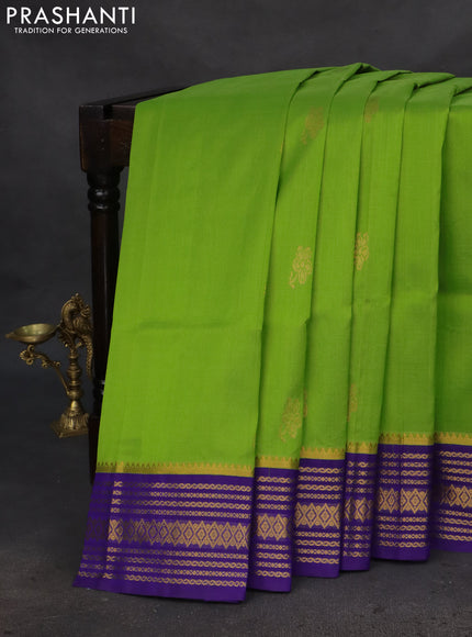 Silk cotton saree light green and blue with zari woven floral buttas and zari woven border