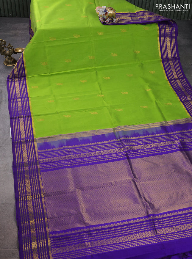 Silk cotton saree light green and blue with zari woven floral buttas and zari woven border