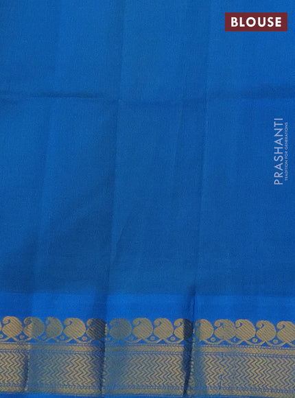 Silk cotton saree light green and cs blue with pailsey zari woven buttas and zari woven korvai border