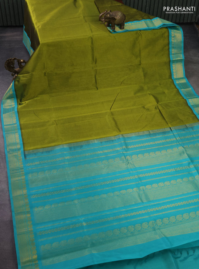 Silk cotton saree mehendi green and teal green with plain body and zari woven korvai border