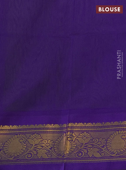 Silk cotton saree light green and violet with plain body and zari woven korvai border