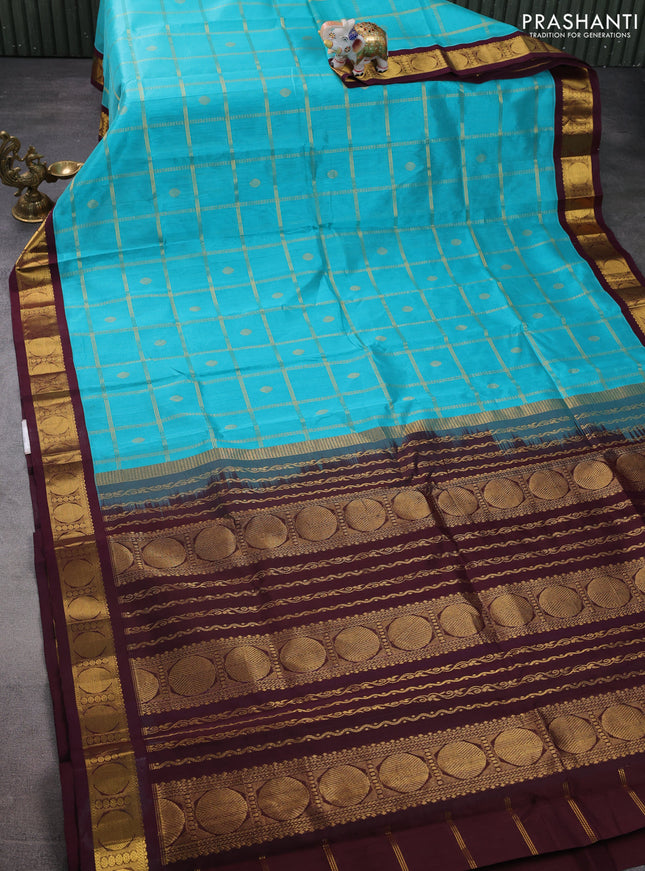 Silk cotton saree teal blue and deep maroon with zari checks & buttas and zari woven korvai border