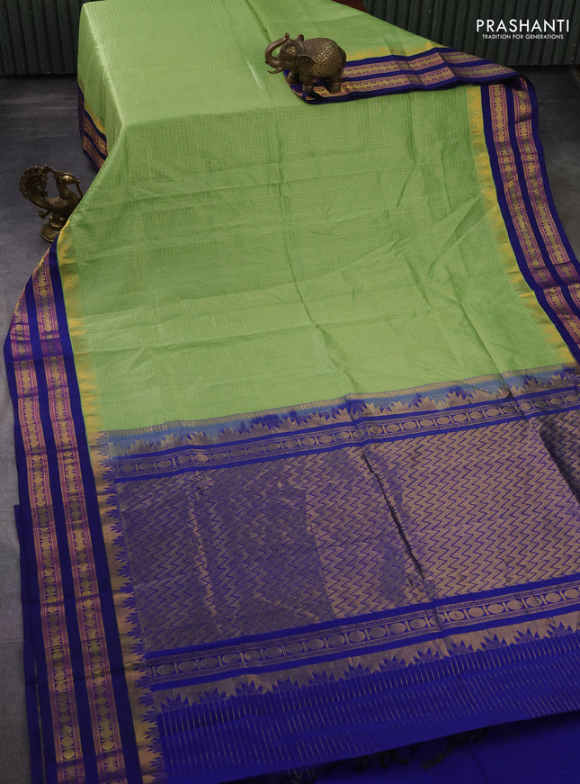 Silk cotton saree light green and blue with allover small zari checked pattern and temple design zari woven korvai border