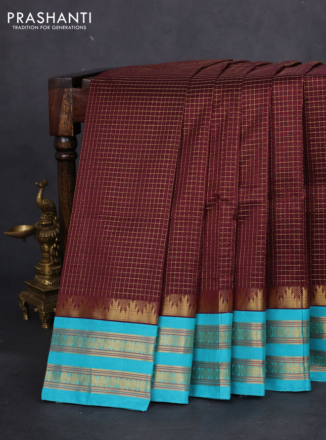 Silk cotton saree deep maroon and teal blue with allover small zari checked pattern and temple design zari woven korvai border