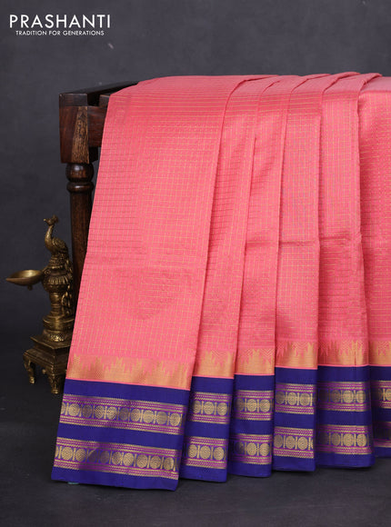 Silk cotton saree peach pink and blue with allover small zari checked pattern and temple design zari woven korvai border