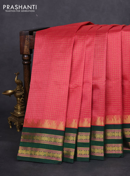 Silk cotton saree peach pink and green with allover small zari checked pattern and temple design zari woven korvai border