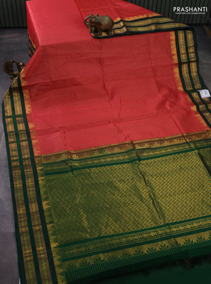 Silk cotton saree peach pink and green with allover small zari checked pattern and temple design zari woven korvai border