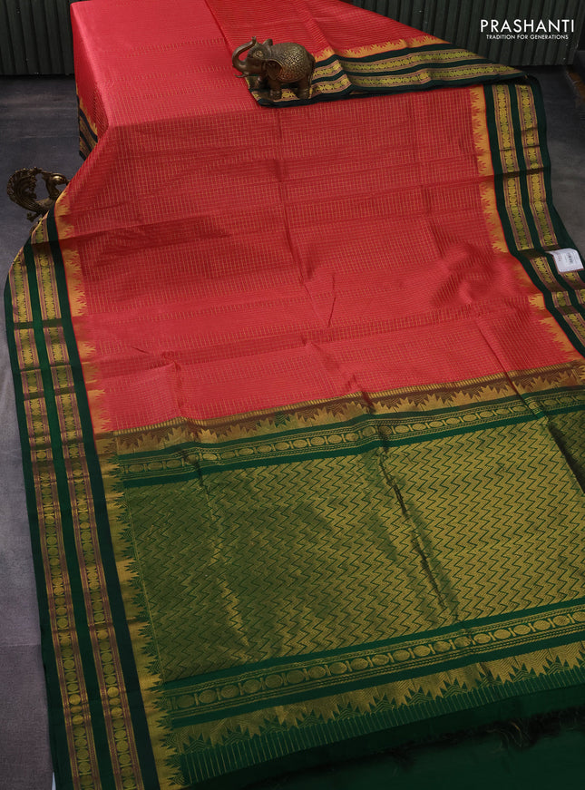 Silk cotton saree peach pink and green with allover small zari checked pattern and temple design zari woven korvai border
