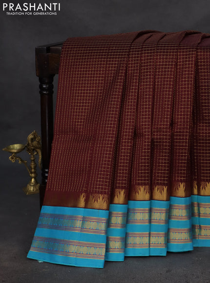 Silk cotton saree deep maroon and teal blue with allover small zari checked pattern and temple design zari woven korvai border