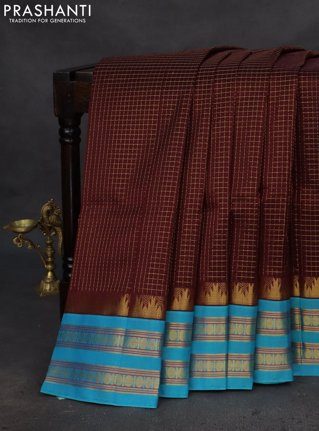 Silk cotton saree deep maroon and teal blue with allover small zari checked pattern and temple design zari woven korvai border